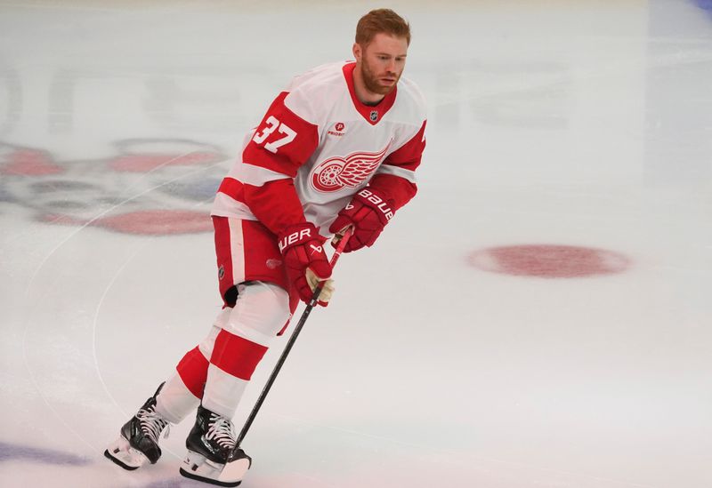 Nov 6, 2024; Chicago, Illinois, USA; Detroit Red Wings left wing J.T. Compher (37) warms up before a game against the Chicago Blackhawks at United Center. Mandatory Credit: David Banks-Imagn Images