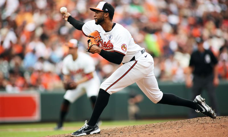 Jun 2, 2024; Baltimore, Maryland, USA; Baltimore Orioles pitcher Dillon Tate (55) throws during the eighth inning against the Tampa Bay Rays at Oriole Park at Camden Yards. Mandatory Credit: Daniel Kucin Jr.-USA TODAY Sports