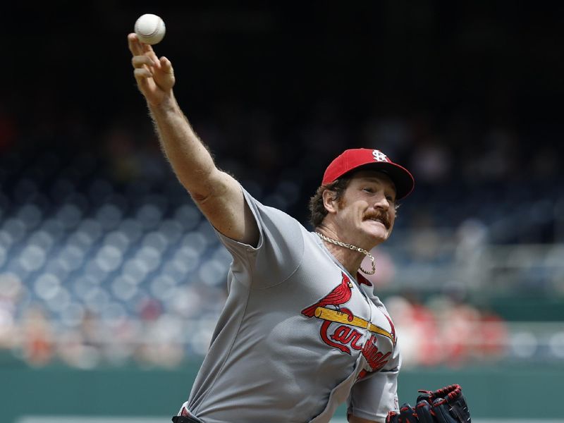 May 11, 2025; Washington, District of Columbia, USA; St. Louis Cardinals pitcher Miles Mikolas (39) pitches against the Washington Nationals during the first inning at Nationals Park. Mandatory Credit: Geoff Burke-Imagn Images