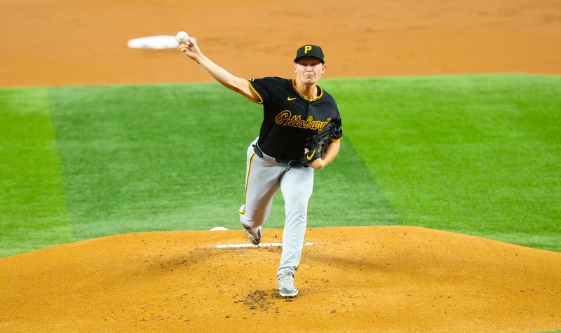 Aug 20, 2024; Arlington, Texas, USA; Pittsburgh Pirates starting pitcher Mitch Keller (23) throws during the first inning against the Texas Rangers  at Globe Life Field. Mandatory Credit: Kevin Jairaj-USA TODAY Sports