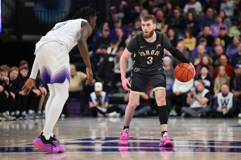 Jan 15, 2025; Seattle, Washington, USA; Purdue Boilermakers guard Braden Smith (3) dribbles the ball while guarded by Washington Huskies guard Zoom Diallo (9) during the first half at Alaska Airlines Arena at Hec Edmundson Pavilion. Mandatory Credit: Steven Bisig-Imagn Images