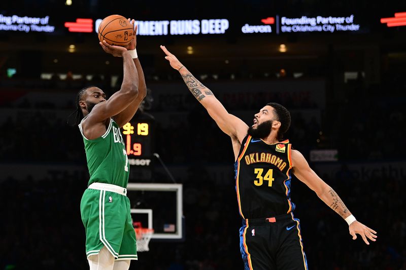 OKLAHOMA CITY, OKLAHOMA - JANUARY 5: Jaylen Brown #7 of the Boston Celtics puts up a shot in front of Kenrich Williams #34 of the Oklahoma City Thunder during the second half at Paycom Center on January 5, 2025 in Oklahoma City, Oklahoma. NOTE TO USER: User expressly acknowledges and agrees that, by downloading and or using this photograph, User is consenting to the terms and conditions of the Getty Images License Agreement. (Photo by Joshua Gateley/Getty Images)