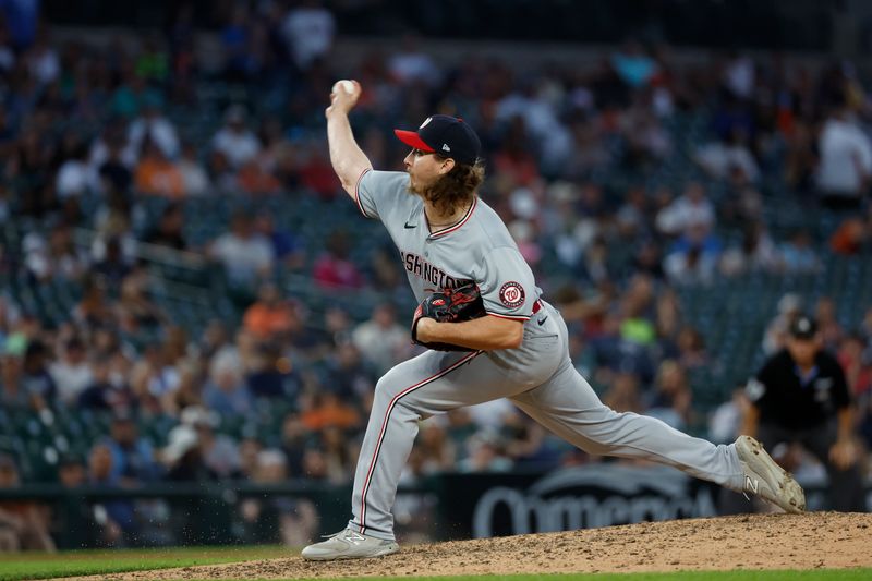 Jun 12, 2024; Detroit, Michigan, USA;  Washington Nationals relief pitcher Hunter Harvey (73) pitches in the eighth inning against the Detroit Tigers at Comerica Park. Mandatory Credit: Rick Osentoski-USA TODAY Sports
