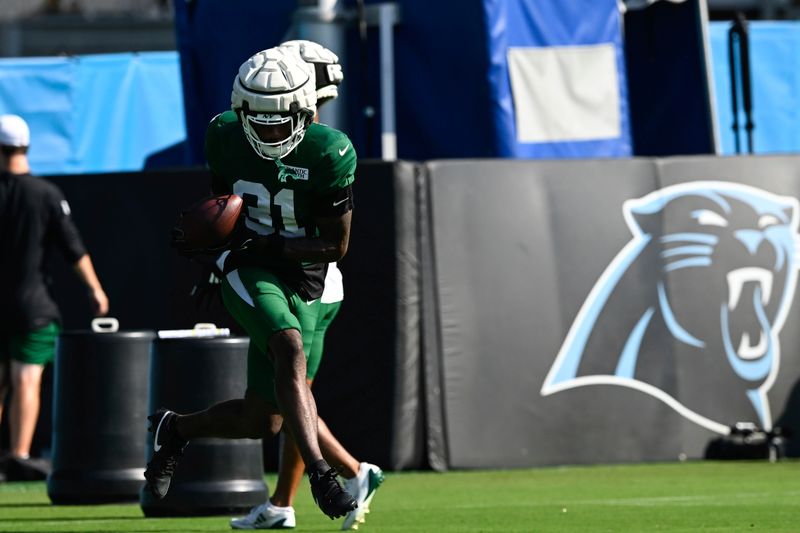 New York Jets wide receiver Isaiah Winstead (31) catches a pass during an NFL football joint practice with the Carolina Panthers Thursday, Aug. 15, 2024, in Charlotte, N.C. (AP Photo/Matt Kelley)