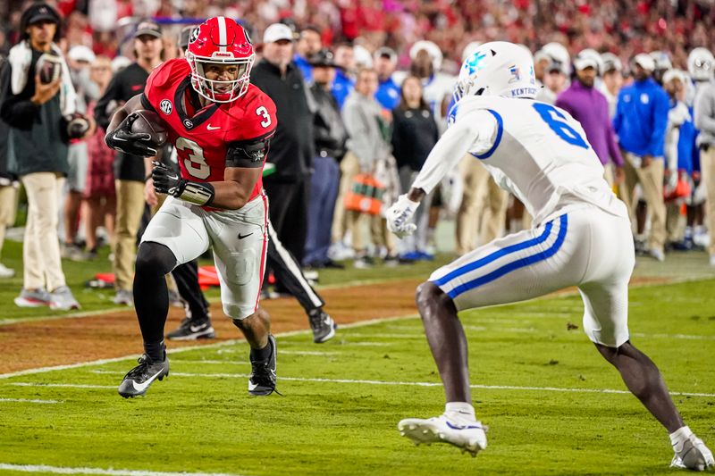 Oct 7, 2023; Athens, Georgia, USA; Georgia Bulldogs running back Andrew Paul (3) runs for a touchdown against the Kentucky Wildcats during the second half at Sanford Stadium. Mandatory Credit: Dale Zanine-USA TODAY Sports