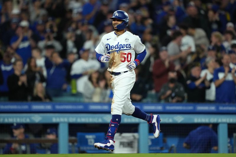 Jun 2, 2023; Los Angeles, California, USA; Los Angeles Dodgers right fielder Mookie Betts (50) rounds the bases after hitting a home run in the sixth inning against the New York Yankees  at Dodger Stadium. Mandatory Credit: Kirby Lee-USA TODAY Sports