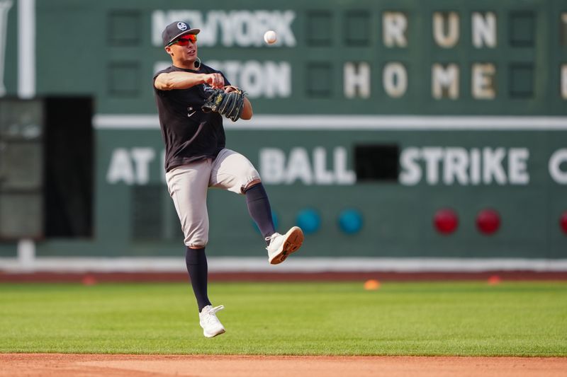 Jul 27, 2024; Boston, Massachusetts, USA; New York Yankees shortstop Anthony Volpe (11) takes infield practice prior to the game against the Boston Red Sox at Fenway Park. Mandatory Credit: Gregory Fisher-USA TODAY Sports