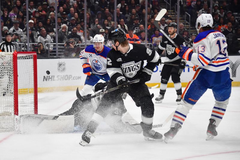 Apr 29, 2025; Los Angeles, California, USA; Edmonton Oilers center Mattias Janmark (13) scores a goal against Los Angeles Kings goaltender Darcy Kuemper (35) during the third period in game five of the first round of the 2025 Stanley Cup Playoffs at Crypto.com Arena. Mandatory Credit: Gary A. Vasquez-Imagn Images