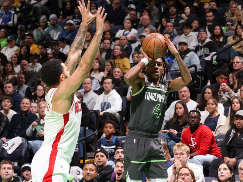 MINNEAPOLIS, MN -  NOVEMBER 26: Rob Dillingham #4 of the Minnesota Timberwolves shoots a three point basket during the game against the Houston Rockets during the Emirates NBA Cup game on November 26, 2024 at Target Center in Minneapolis, Minnesota. NOTE TO USER: User expressly acknowledges and agrees that, by downloading and or using this Photograph, user is consenting to the terms and conditions of the Getty Images License Agreement. Mandatory Copyright Notice: Copyright 2024 NBAE (Photo by David Sherman/NBAE via Getty Images)