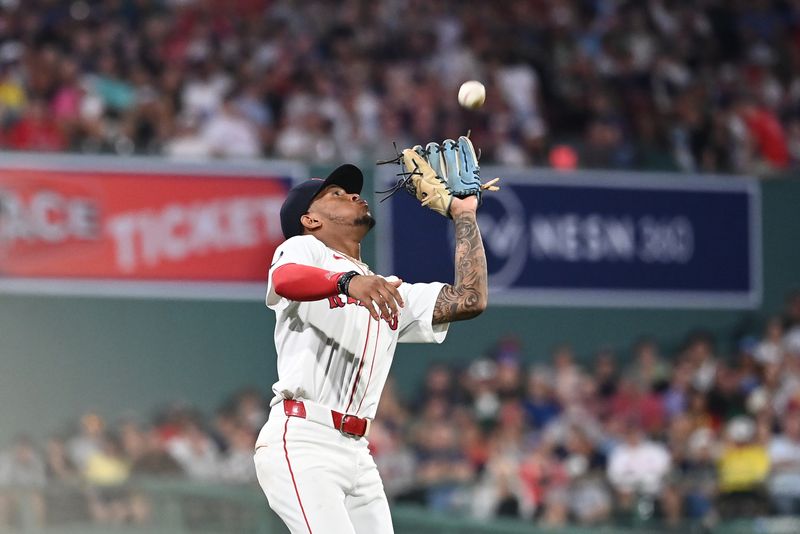 Jul 30, 2024; Boston, Massachusetts, USA; Boston Red Sox shortstop Ceddanne Rafaela (43) makes a catch for an out against the Seattle Mariners during the sixth inning at Fenway Park. Mandatory Credit: Eric Canha-USA TODAY Sports