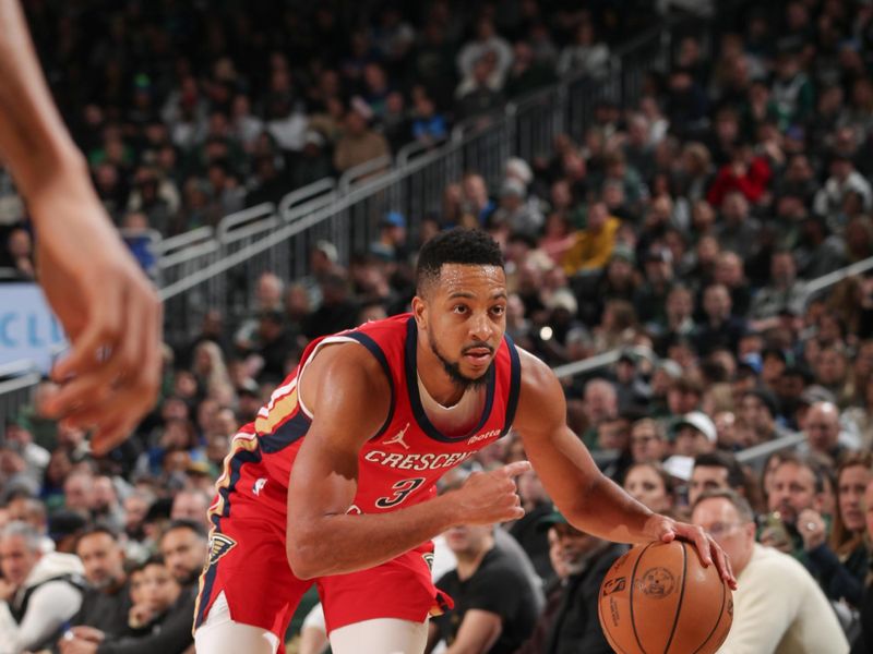 MILWAUKEE, WI - JANUARY 27:  CJ McCollum #3 of the New Orleans Pelicans handles the ball during the game   on January 27, 2024 at the Fiserv Forum Center in Milwaukee, Wisconsin. NOTE TO USER: User expressly acknowledges and agrees that, by downloading and or using this Photograph, user is consenting to the terms and conditions of the Getty Images License Agreement. Mandatory Copyright Notice: Copyright 2024 NBAE (Photo by Gary Dineen/NBAE via Getty Images).