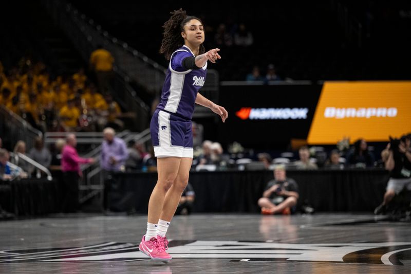 Mar 7, 2025; Kansas City, MO, USA; Kansas State Wildcats guard Zyanna Walker (1) points to a teammate after a play against the West Virginia Mountaineers in the third quarter at T-Mobile Center. Mandatory Credit: Amy Kontras-Imagn Images