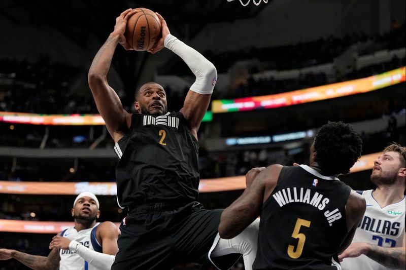 DALLAS, TEXAS - JANUARY 09: Xavier Tillman #2 of the Memphis Grizzlies drives to the basket during the second half against the Dallas Mavericks at American Airlines Center on January 09, 2024 in Dallas, Texas. NOTE TO USER: User expressly acknowledges and agrees that, by downloading and or using this photograph, User is consenting to the terms and conditions of the Getty Images License Agreement. (Photo by Sam Hodde/Getty Images)