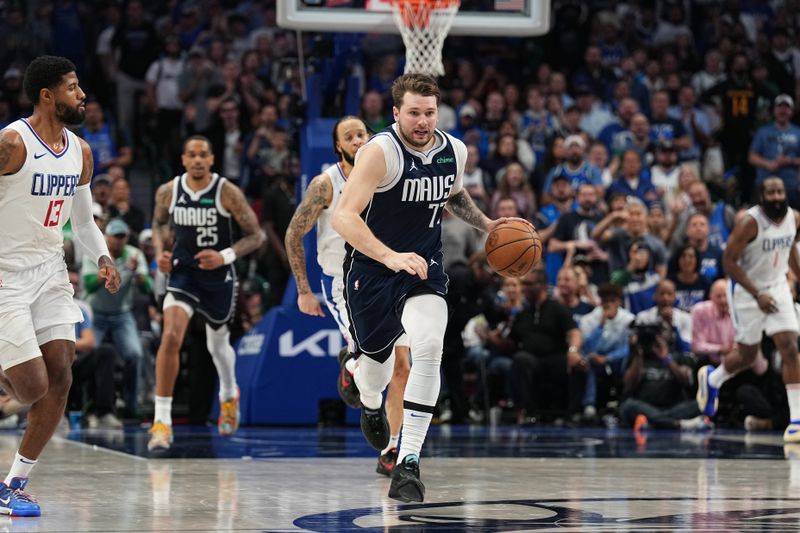 DALLAS, TX - APRIL 28: Luka Doncic #77 of the Dallas Mavericks handles the ball during the game against the LA Clippers during Round 1 Game 4 of the 2024NBA Playoffs on April 28, 2024 at the American Airlines Center in Dallas, Texas. NOTE TO USER: User expressly acknowledges and agrees that, by downloading and or using this photograph, User is consenting to the terms and conditions of the Getty Images License Agreement. Mandatory Copyright Notice: Copyright 2024 NBAE (Photo by Glenn James/NBAE via Getty Images)