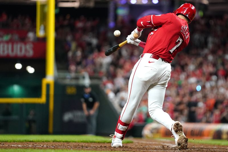 May 5, 2024; Cincinnati, Ohio, USA; Cincinnati Reds outfielder Spencer Steer (7) hits a one-run single in the ninth inning against the Baltimore Orioles at Great American Ball Park in Cincinnati. Mandatory Credit: Kareem Elgazzar-USA TODAY Sports