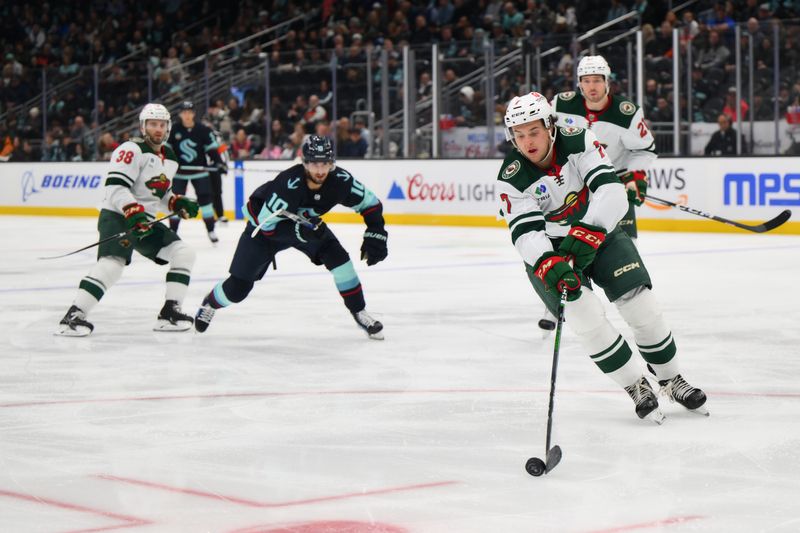 Dec 10, 2023; Seattle, Washington, USA; Minnesota Wild defenseman Brock Faber (7) plays the puck during the second period against the Seattle Kraken at Climate Pledge Arena. Mandatory Credit: Steven Bisig-USA TODAY Sports