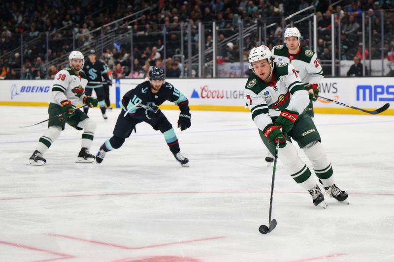 Dec 10, 2023; Seattle, Washington, USA; Minnesota Wild defenseman Brock Faber (7) plays the puck during the second period against the Seattle Kraken at Climate Pledge Arena. Mandatory Credit: Steven Bisig-USA TODAY Sports