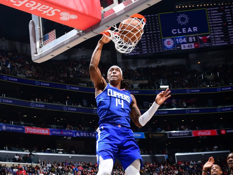 LOS ANGELES, CA - MARCH 27: Terance Mann #14 of the LA Clippers dunks the ball during the game against the Chicago Bulls on March 27, 2023 at Crypto.Com Arena in Los Angeles, California. NOTE TO USER: User expressly acknowledges and agrees that, by downloading and/or using this Photograph, user is consenting to the terms and conditions of the Getty Images License Agreement. Mandatory Copyright Notice: Copyright 2023 NBAE (Photo by Adam Pantozzi/NBAE via Getty Images)