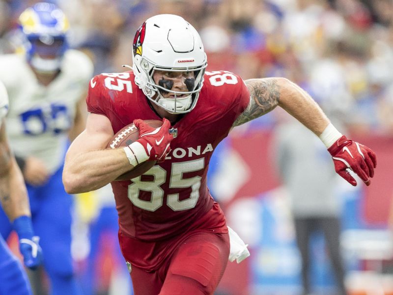 Arizona Cardinals tight end Trey McBride (85) catches a pass and runs against the Los Angeles Rams in an NFL football game, Sunday, Sept. 15, 2024, in Glendale, Ariz. (AP Photo/Jeff Lewis)