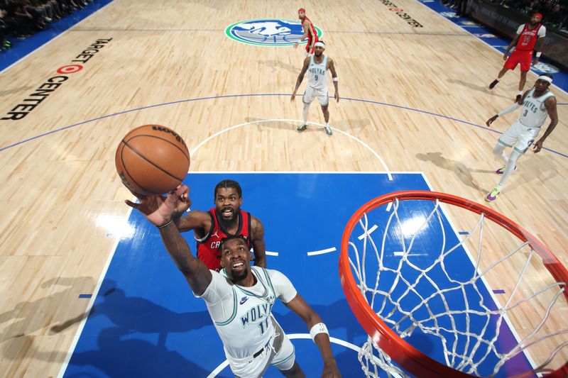 MINNEAPOLIS, MN -  JANUARY 3:  Naz Reid #11 of the Minnesota Timberwolves grabs a rebound during the game against the New Orleans Pelicans on January 3, 2024 at Target Center in Minneapolis, Minnesota. NOTE TO USER: User expressly acknowledges and agrees that, by downloading and or using this Photograph, user is consenting to the terms and conditions of the Getty Images License Agreement. Mandatory Copyright Notice: Copyright 2024 NBAE (Photo by Jordan Johnson/NBAE via Getty Images)