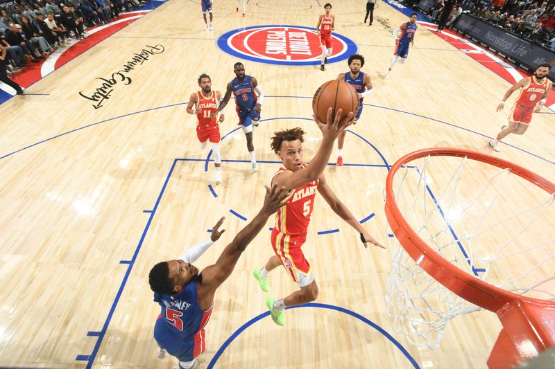 DETROIT, MI - NOVEMBER 8: Dyson Daniels #5 of the Atlanta Hawks shoots the ball during the game against the Detroit Pistons on November  8, 2024 at Little Caesars Arena in Detroit, Michigan. NOTE TO USER: User expressly acknowledges and agrees that, by downloading and/or using this photograph, User is consenting to the terms and conditions of the Getty Images License Agreement. Mandatory Copyright Notice: Copyright 2024 NBAE (Photo by Chris Schwegler/NBAE via Getty Images)