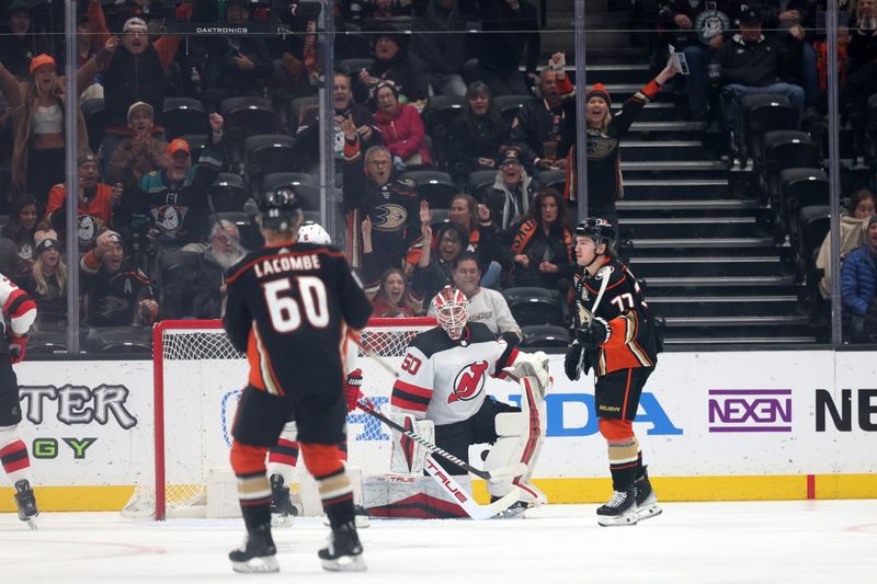 Mar 1, 2024; Anaheim, California, USA; New Jersey Devils goaltender Nico Daws (50) reacts after giving up a goal to Anaheim Ducks right wing Frank Vatrano (77) during the first period at Honda Center. Mandatory Credit: Kiyoshi Mio-USA TODAY Sports