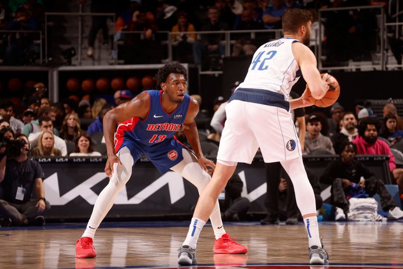 DETROIT, MI - MARCH 9: James Wiseman #13 of the Detroit Pistons plays defense against the Dallas Mavericks on March 9, 2024 at Little Caesars Arena in Detroit, Michigan. NOTE TO USER: User expressly acknowledges and agrees that, by downloading and/or using this photograph, User is consenting to the terms and conditions of the Getty Images License Agreement. Mandatory Copyright Notice: Copyright 2024 NBAE (Photo by Brian Sevald/NBAE via Getty Images)