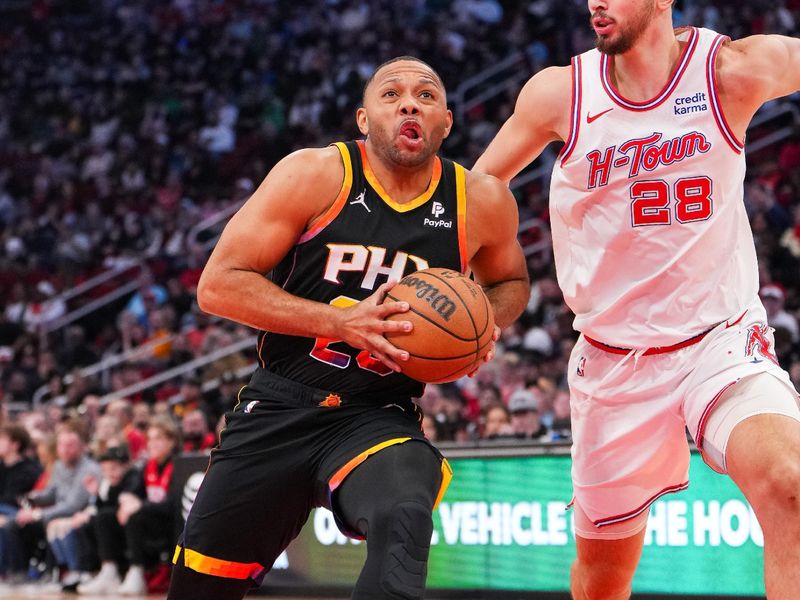 HOUSTON, TEXAS - DECEMBER 27: Eric Gordon #23 of the Phoenix Suns goes up for a shot during the second quarter of the game against the Houston Rockets at Toyota Center on December 27, 2023 in Houston, Texas. User expressly acknowledges and agrees that, by downloading and or using this photograph, User is consenting to the terms and conditions of the Getty Images License Agreement. (Photo by Alex Bierens de Haan/Getty Images)