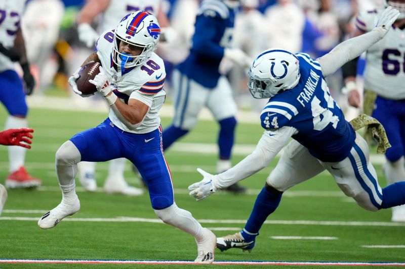 Buffalo Bills wide receiver Khalil Shakir (10) runs after a catch past Indianapolis Colts linebacker Zaire Franklin (44) during the second half of an NFL football game, Sunday, Nov. 10, 2024, in Indianapolis. (AP Photo/Darron Cummings)