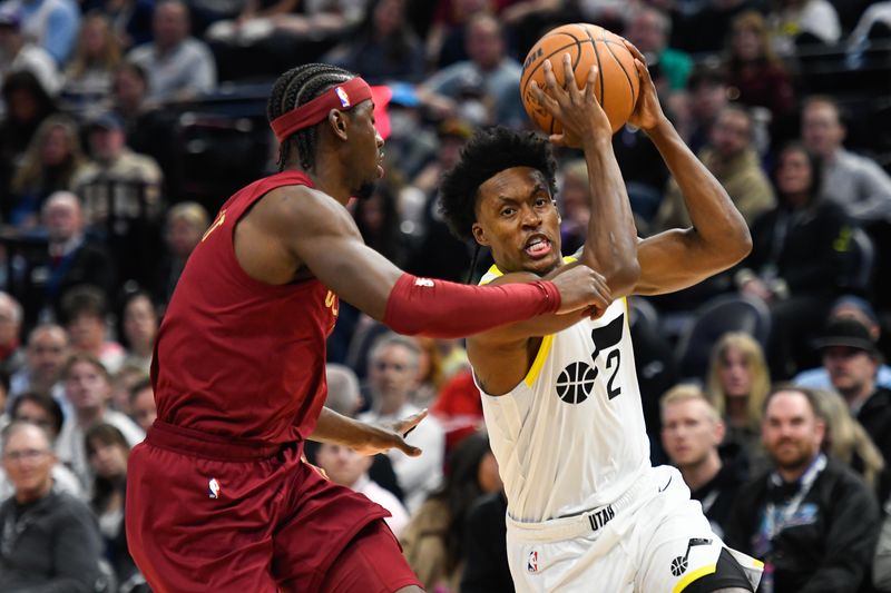 SALT LAKE CITY, UTAH - APRIL 02: Collin Sexton #2 of the Utah Jazz drives past Caris LeVert #3 of the Cleveland Cavaliers during the first half of a game at Delta Center on April 02, 2024 in Salt Lake City, Utah. NOTE TO USER: User expressly acknowledges and agrees that, by downloading and or using this photograph, User is consenting to the terms and conditions of the Getty Images License Agreement. (Photo by Alex Goodlett/Getty Images)