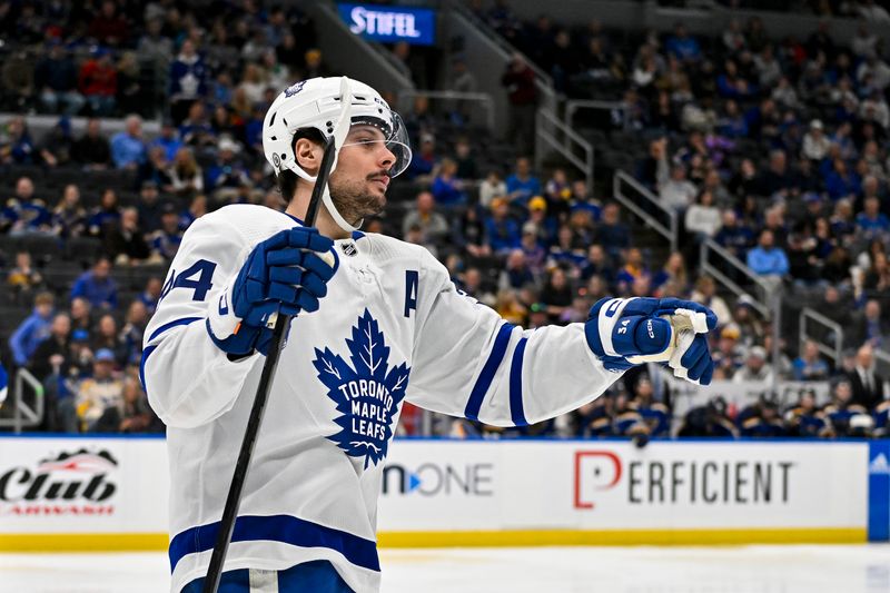 Feb 19, 2024; St. Louis, Missouri, USA;  Toronto Maple Leafs center Auston Matthews (34) reacts after scoring against the St. Louis Blues during the third period at Enterprise Center. Mandatory Credit: Jeff Curry-USA TODAY Sports