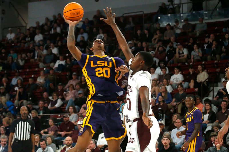 Feb 8, 2023; Starkville, Mississippi, USA; LSU Tigers forward Derek Fountain (20) shoots as Mississippi State Bulldogs guard Shawn Jones Jr. (30) defends during the second half at Humphrey Coliseum. Mandatory Credit: Petre Thomas-USA TODAY Sports