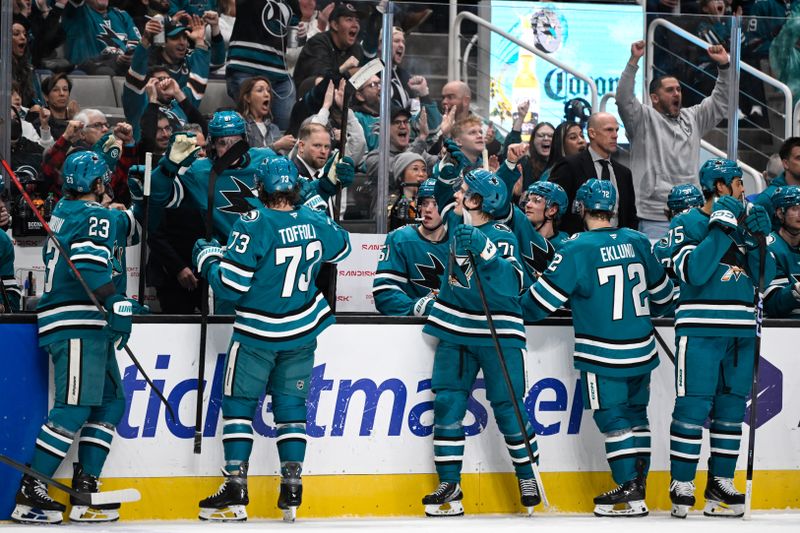 Nov 28, 2025; San Jose, California, USA; The San Jose Sharks celebrate a goal by right winger Adam Gaudette (81) after an official review against the Vancouver Canucks in the second period at SAP Center at San Jose. Mandatory Credit: Eakin Howard-Imagn Images