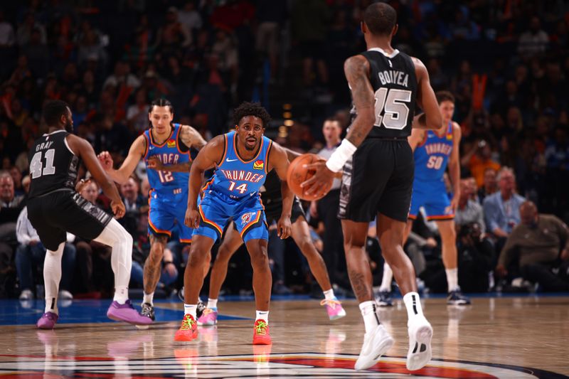 OKLAHOMA CITY, OK - APRIL 10:  Adam Flagler #14 of the Oklahoma City Thunder plays defense against the San Antonio Spurs on April 10, 2024 at Paycom Arena in Oklahoma City, Oklahoma. NOTE TO USER: User expressly acknowledges and agrees that, by downloading and or using this photograph, User is consenting to the terms and conditions of the Getty Images License Agreement. Mandatory Copyright Notice: Copyright 2024 NBAE (Photo by Zach Beeker/NBAE via Getty Images)