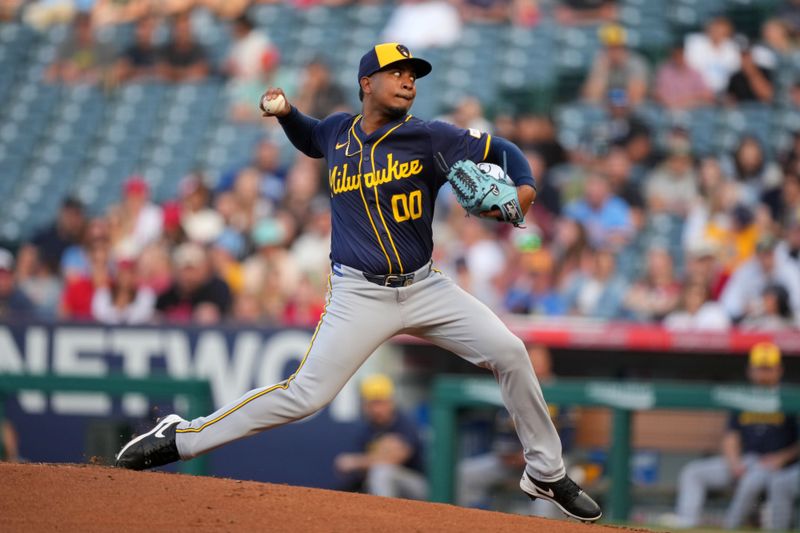 Jun 17, 2024; Anaheim, California, USA; Milwaukee Brewers starting pitcher Carlos F. Rodriguez (0) throws in the second inning against the Los Angeles Angels at Angel Stadium. Mandatory Credit: Kirby Lee-USA TODAY Sports