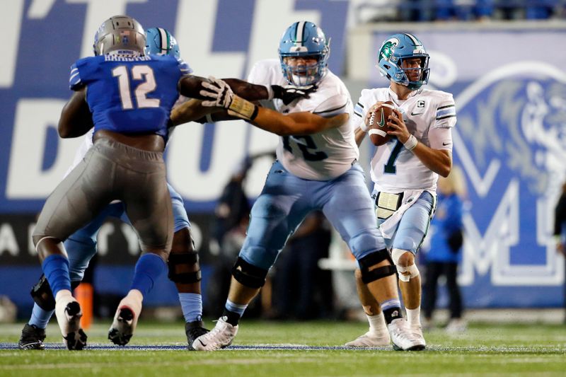 Oct 13, 2023; Memphis, Tennessee, USA; Tulane Green Wave quarterback Michael Pratt (7) drops back to pass during the first half against the Memphis Tigers at Simmons Bank Liberty Stadium. Mandatory Credit: Petre Thomas-USA TODAY Sports