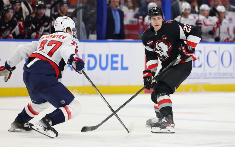 Apr 2, 2024; Buffalo, New York, USA;  Buffalo Sabres right wing Jack Quinn (22) looks for the puck during the second period against the Washington Capitals at KeyBank Center. Mandatory Credit: Timothy T. Ludwig-USA TODAY Sports