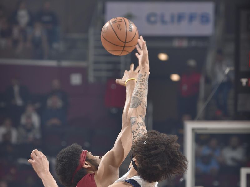 CLEVELAND, OH - FEBRUARY 27: The Dallas Mavericks and the Cleveland Cavaliers go for the opening tip off during the game on February 27, 2024 at Rocket Mortgage FieldHouse in Cleveland, Ohio. NOTE TO USER: User expressly acknowledges and agrees that, by downloading and/or using this Photograph, user is consenting to the terms and conditions of the Getty Images License Agreement. Mandatory Copyright Notice: Copyright 2024 NBAE (Photo by David Liam Kyle/NBAE via Getty Images)