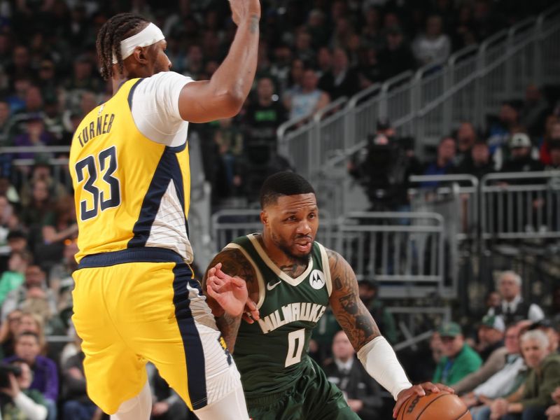 MILWAUKEE, WI - APRIL 21: Damian Lillard #0 of the Milwaukee Bucks dribbles the ball during the game against the Indiana Pacers during Round 1 Game 1 of the 2024 NBA Playoffs on April 21, 2024 at the Fiserv Forum Center in Milwaukee, Wisconsin. NOTE TO USER: User expressly acknowledges and agrees that, by downloading and or using this Photograph, user is consenting to the terms and conditions of the Getty Images License Agreement. Mandatory Copyright Notice: Copyright 2024 NBAE (Photo by Gary Dineen/NBAE via Getty Images).