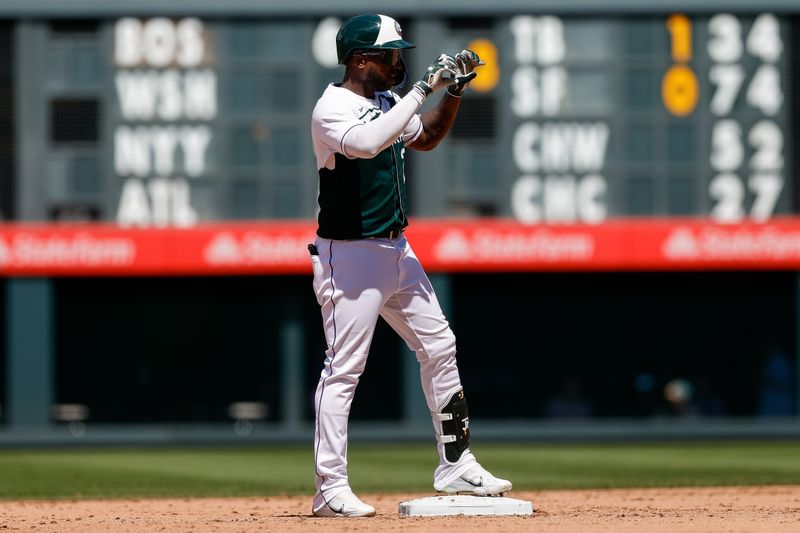 Aug 16, 2023; Denver, Colorado, USA; Colorado Rockies left fielder Jurickson Profar (29) reacts from second after hitting a double in the fifth inning against the Arizona Diamondbacks at Coors Field. Mandatory Credit: Isaiah J. Downing-USA TODAY Sports