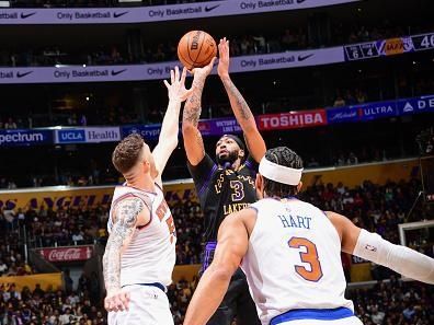 LOS ANGELES, CA - DECEMBER 18:  Anthony Davis #3 of the Los Angeles Lakers shoots the ball during the game on December 18, 2023 at Crypto.Com Arena in Los Angeles, California. NOTE TO USER: User expressly acknowledges and agrees that, by downloading and/or using this Photograph, user is consenting to the terms and conditions of the Getty Images License Agreement. Mandatory Copyright Notice: Copyright 2023 NBAE (Photo by Adam Pantozzi/NBAE via Getty Images)