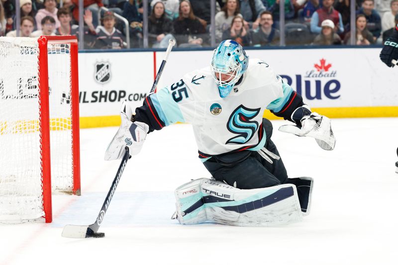 Mar 21, 2026; Columbus, Ohio, USA; Seattle Kraken goalie Joey Daccord (35) makes a save against the Columbus Blue Jackets during the second period at Nationwide Arena. Mandatory Credit: Russell LaBounty-Imagn Images