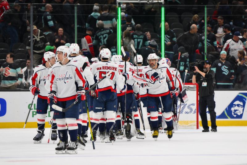 Mar 14, 2024; Seattle, Washington, USA; The Washington Capitals celebrate after defeating the Seattle Kraken at Climate Pledge Arena. Mandatory Credit: Steven Bisig-USA TODAY Sports