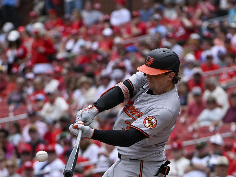 May 22, 2024; St. Louis, Missouri, USA;  Baltimore Orioles designated hitter Adley Rutschman (35) hits a single against the St. Louis Cardinals during the first inning at Busch Stadium. Mandatory Credit: Jeff Curry-USA TODAY Sports