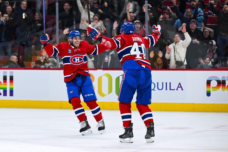 Jan 15, 2024; Montreal, Quebec, CAN; Montreal Canadiens right wing Joel Armia (40) celebrates his goal against the Colorado Avalanche with defenseman Jayden Struble (47) during the third period at Bell Centre. Mandatory Credit: David Kirouac-USA TODAY Sports