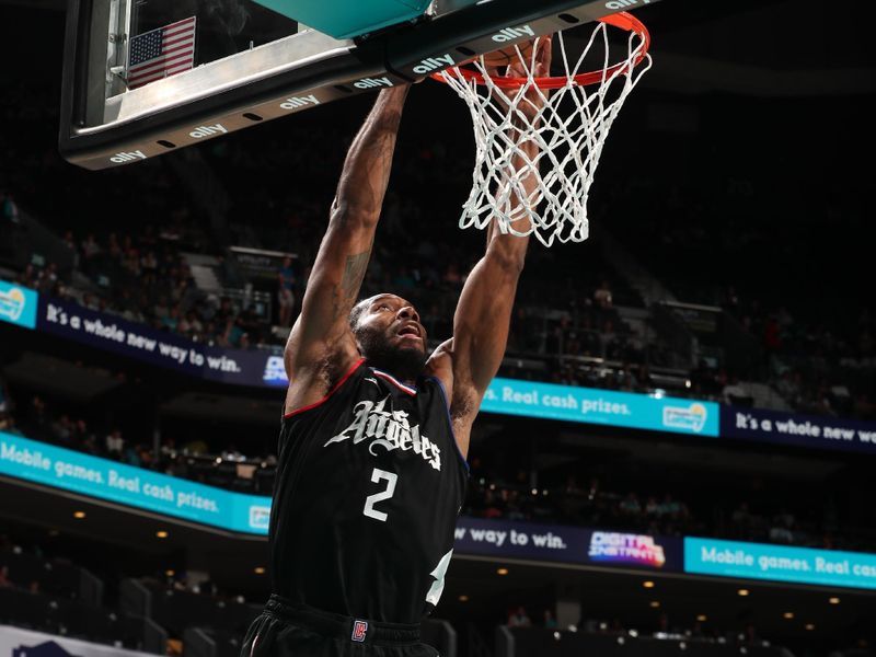 CHARLOTTE, NC - MARCH 31: Kawhi Leonard #2 of the LA Clippers dunks the ball during the game against the Charlotte Hornets on March 31, 2024 at Spectrum Center in Charlotte, North Carolina. NOTE TO USER: User expressly acknowledges and agrees that, by downloading and or using this photograph, User is consenting to the terms and conditions of the Getty Images License Agreement. Mandatory Copyright Notice: Copyright 2024 NBAE (Photo by Kent Smith/NBAE via Getty Images)