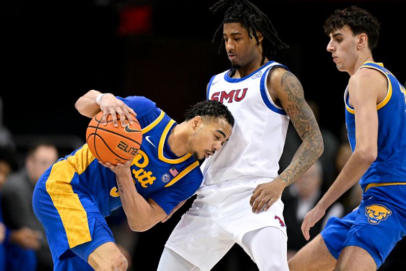 Feb 11, 2025; Dallas, Texas, USA; Pittsburgh Panthers guard Ishmael Leggett (5) looks to move the ball past Southern Methodist Mustangs guard B.J. Edwards (0) during the second half at Moody Coliseum. Mandatory Credit: Jerome Miron-Imagn Images