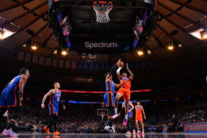 NEW YORK, NY - MARCH 31: Jalen Williams #8 of the Oklahoma City Thunder drives to the basket during the game against the New York Knicks on March 31, 2024 at Madison Square Garden in New York City, New York.  NOTE TO USER: User expressly acknowledges and agrees that, by downloading and or using this photograph, User is consenting to the terms and conditions of the Getty Images License Agreement. Mandatory Copyright Notice: Copyright 2024 NBAE  (Photo by Jesse D. Garrabrant/NBAE via Getty Images)