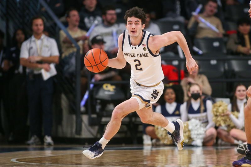 Jan 9, 2024; Atlanta, Georgia, USA; Notre Dame Fighting Irish guard Logan Imes (2) dribbles against the Georgia Tech Yellow Jackets in the first half at McCamish Pavilion. Mandatory Credit: Brett Davis-USA TODAY Sports