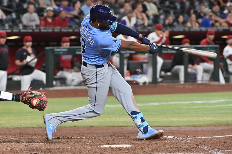 Apr 24, 2025; Phoenix, Arizona, USA;  Arizona Diamondbacks second base Tim Tawa (13) hits an RBI double in the tenth inning against the Arizona Diamondbacks at Chase Field. Mandatory Credit: Matt Kartozian-Imagn Images